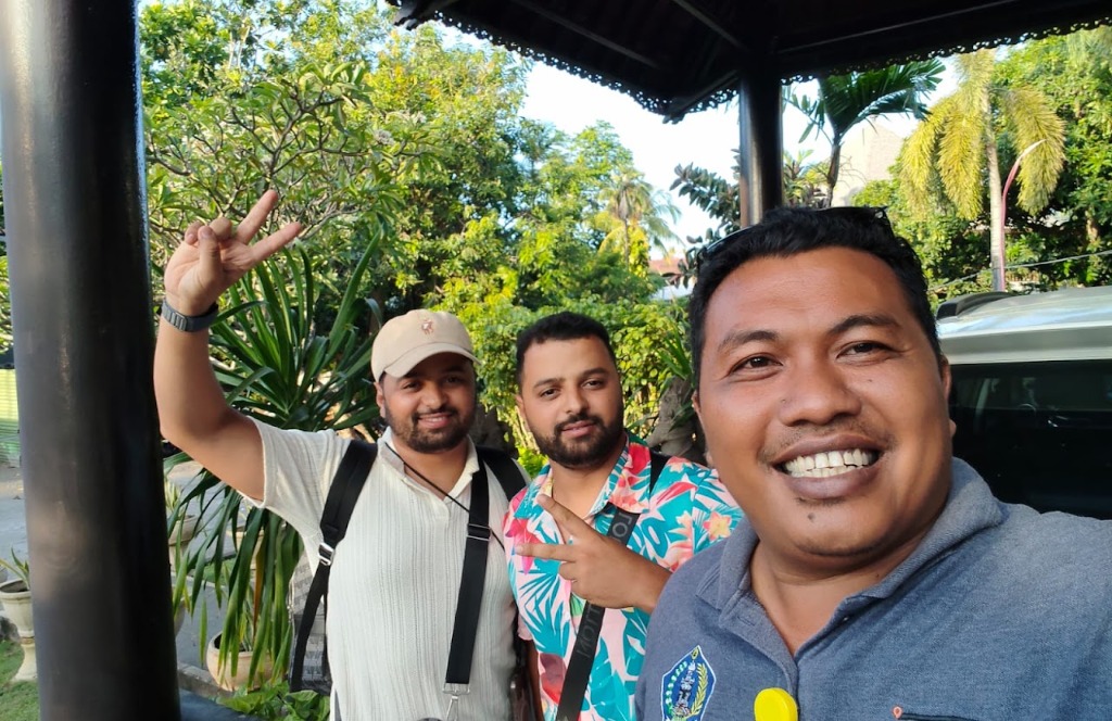 Group of friends happy traveling in Bali with Wayan
